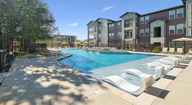 a view of a patio with a yard