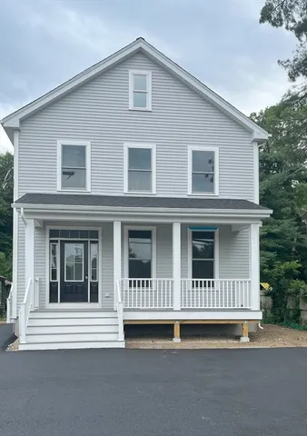 a front view of a house with a balcony
