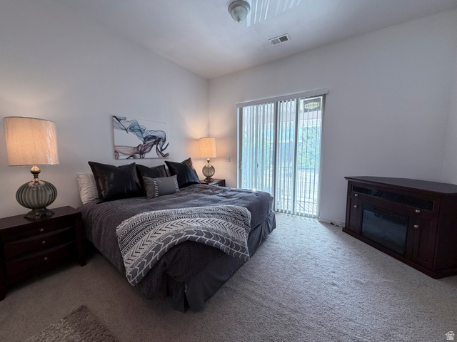 2855 South 1000 West Perry, UT 84302 - Photo 108 of 142 Carpeted bedroom featuring access to exterior