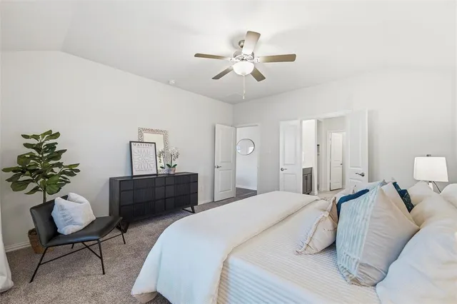 a bathroom with a double vanity sink mirror and shower