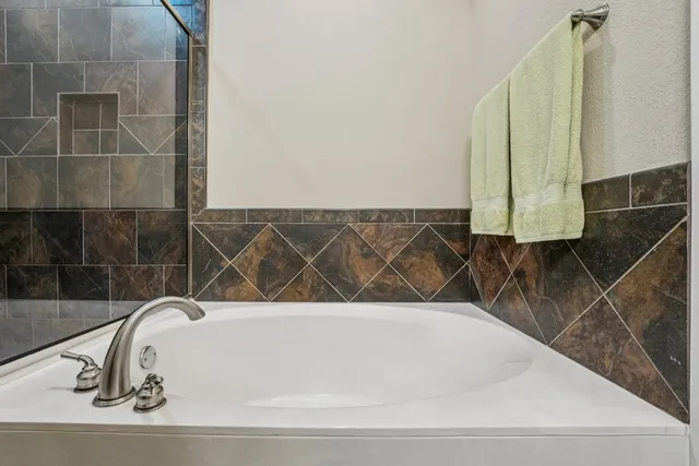 a bathroom with a bathtub