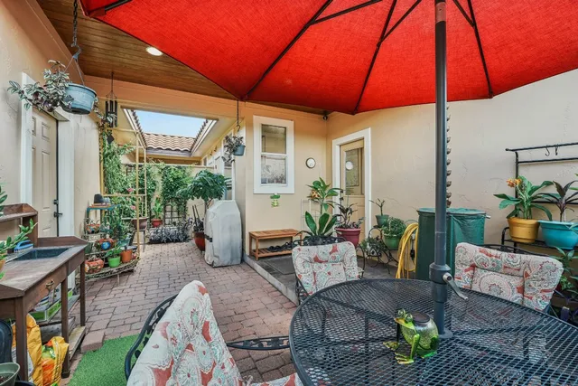 a backyard of a house with seating space