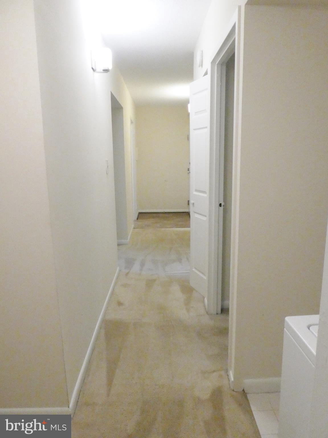 2220 Castle Rock Square, Unit 1B Reston, VA 20191 - Photo 25 of 36 View from BR area, past Washer/Dryer to main area