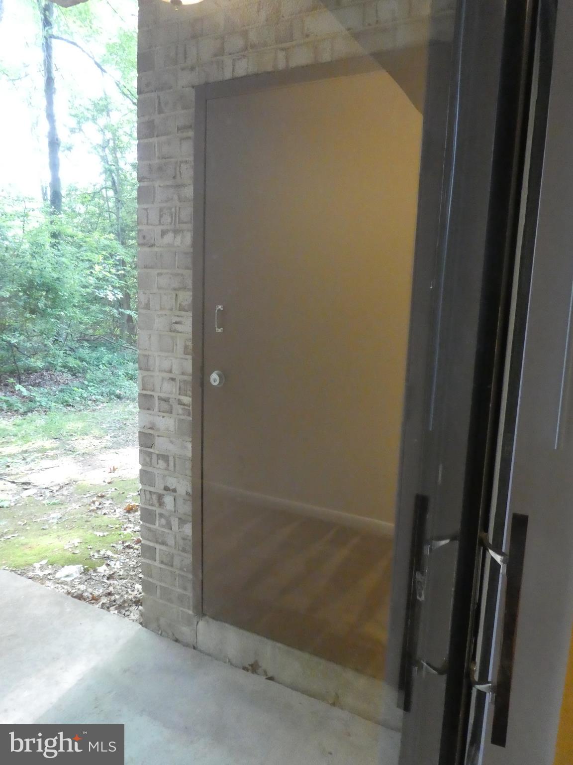 2220 Castle Rock Square, Unit 1B Reston, VA 20191 - Photo 27 of 36 On Patio, door to HVAC system