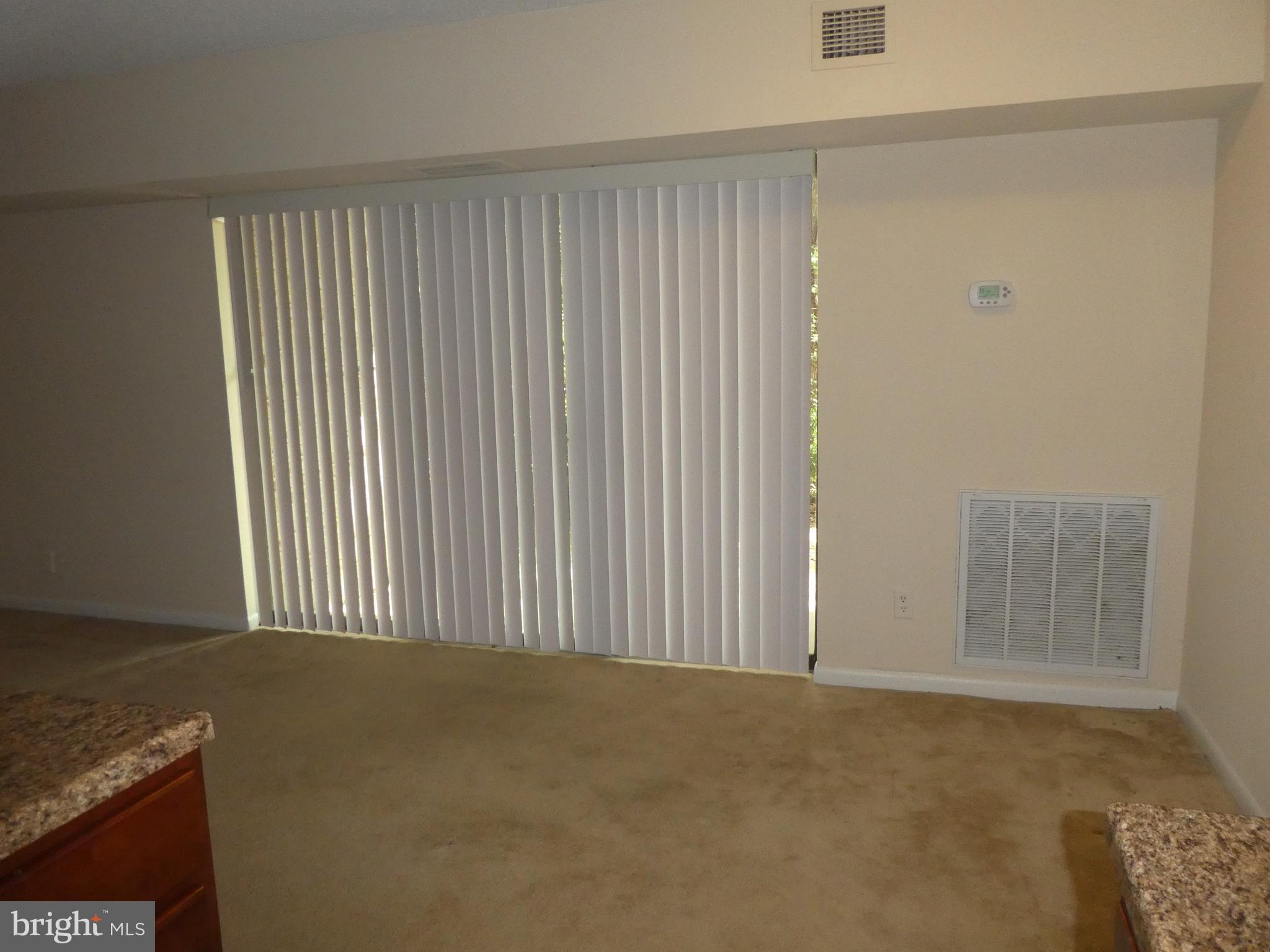 2220 Castle Rock Square, Unit 1B Reston, VA 20191 - Photo 5 of 36 Nice Dining area from Kitchen. Vertical blinds
