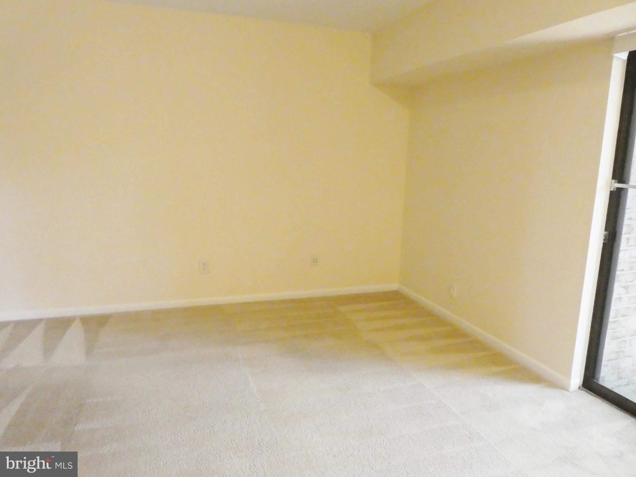 2220 Castle Rock Square, Unit 1B Reston, VA 20191 - Photo 7 of 36 Large Living Room, view from DR