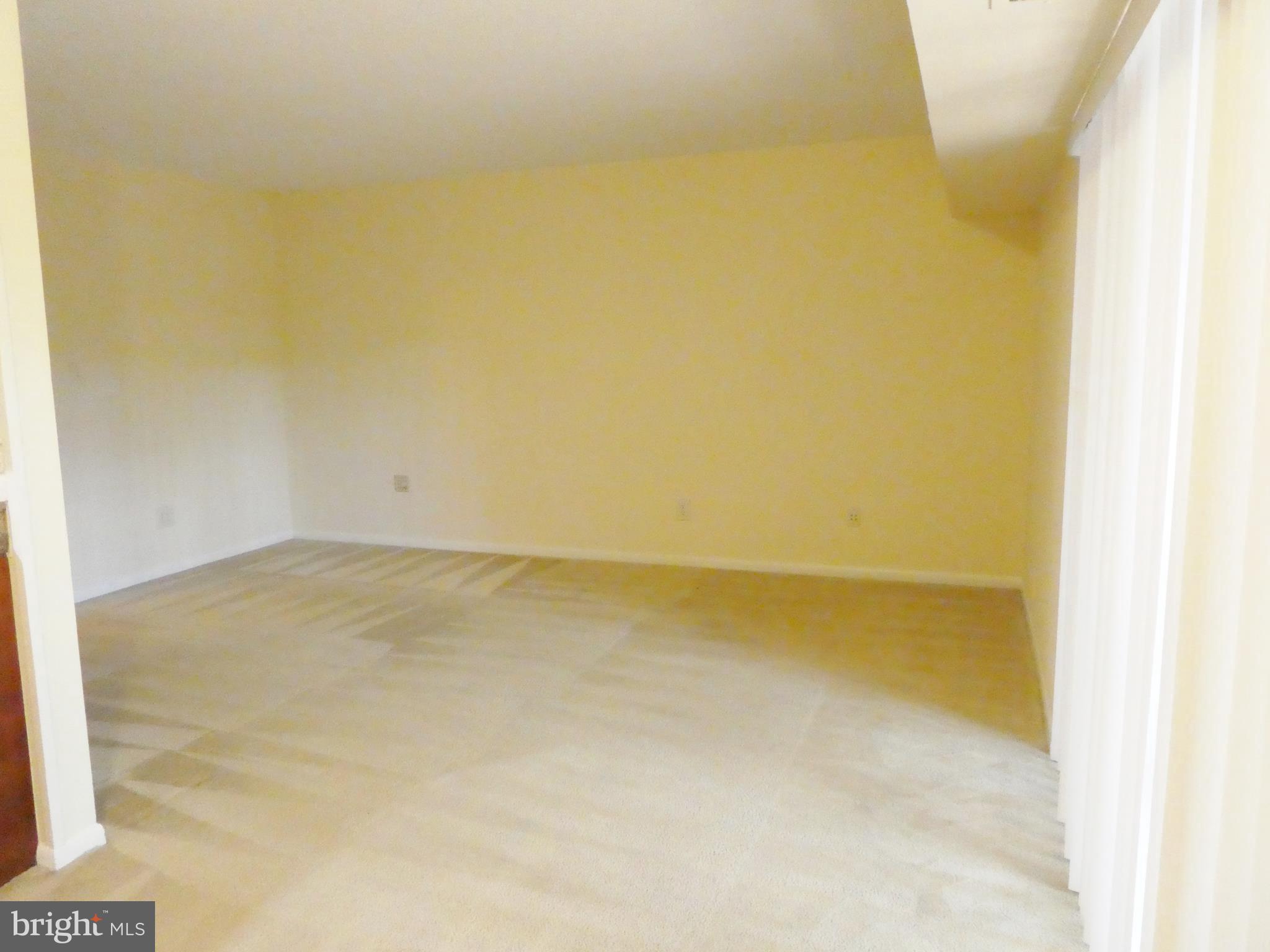 2220 Castle Rock Square, Unit 1B Reston, VA 20191 - Photo 8 of 36 View from Dining area to large Living Room