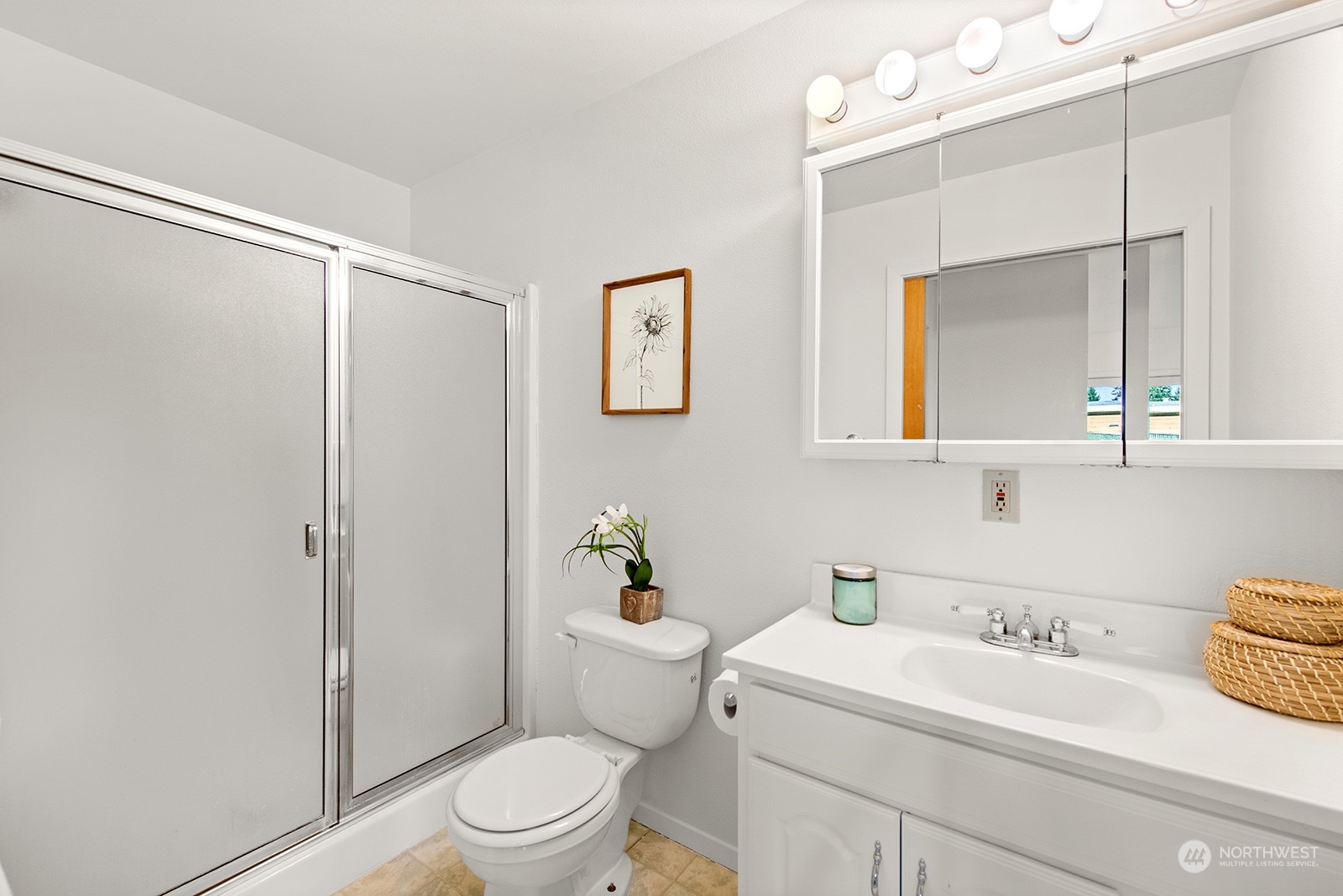 2210 Northeast 8th Street Renton, WA 98056 - Photo 15 of 24 a white toilet sitting next to a bathroom sink