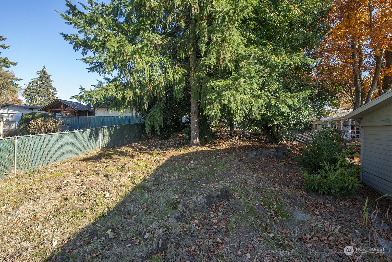 2210 Northeast 8th Street Renton, WA 98056 - Photo 19 of 24 a view of a lake with a large trees