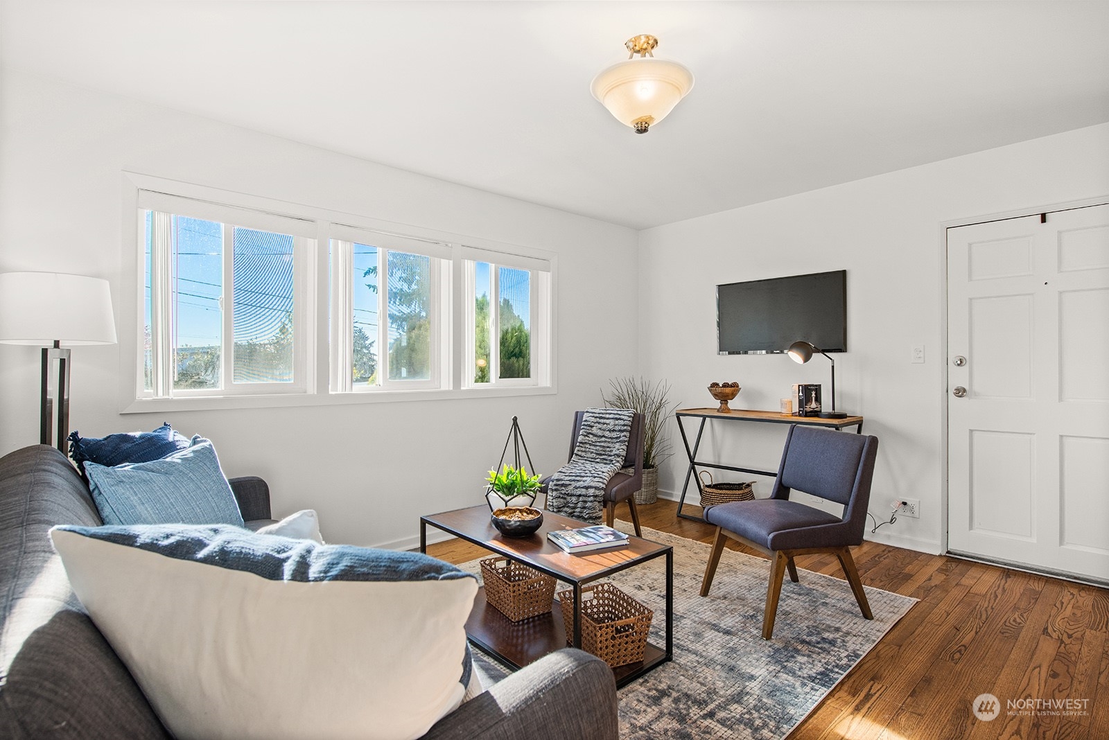 2210 Northeast 8th Street Renton, WA 98056 - Photo 2 of 24 a living room with furniture and wooden floor