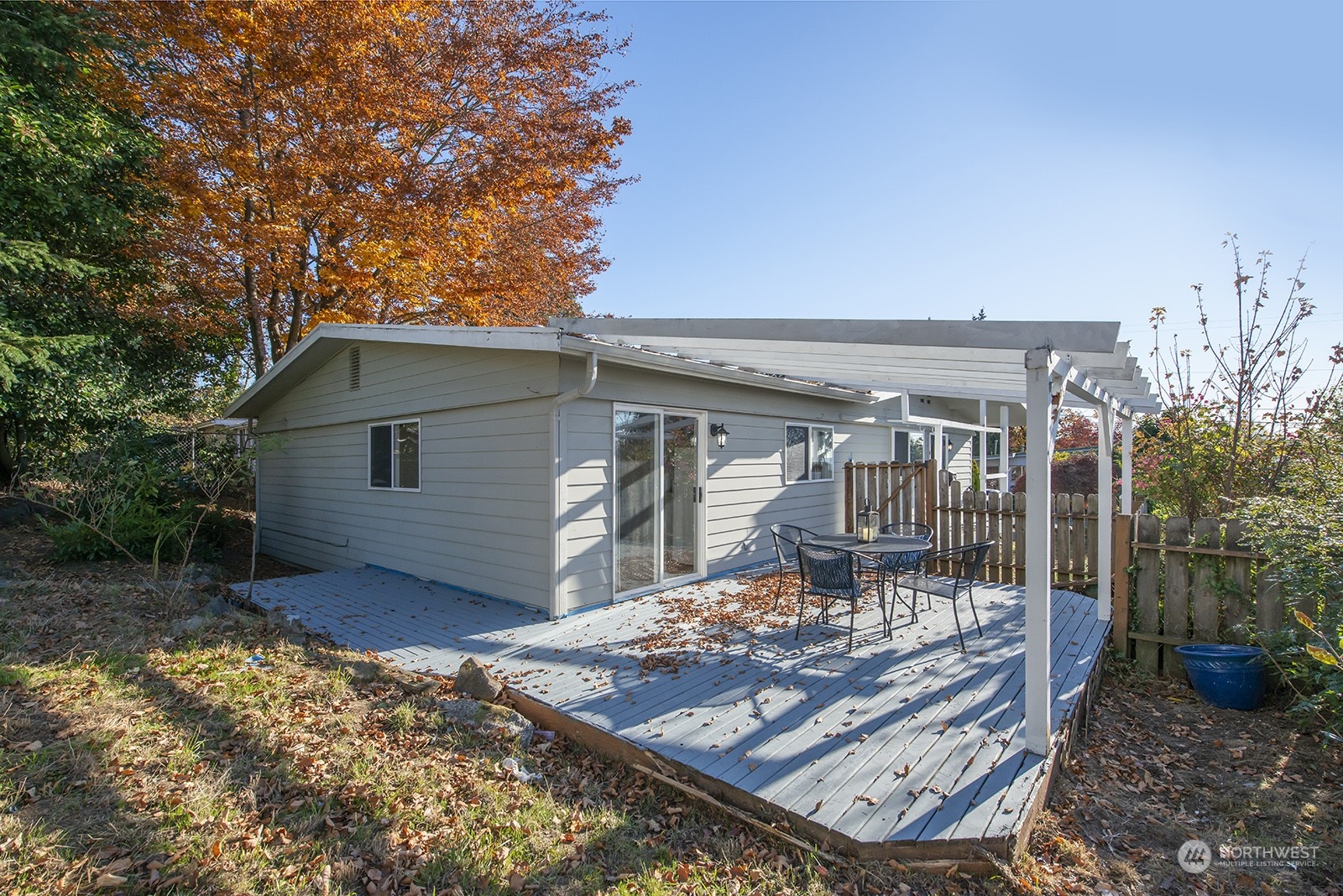 2210 Northeast 8th Street Renton, WA 98056 - Photo 21 of 24 a view of a house with yard and sitting area