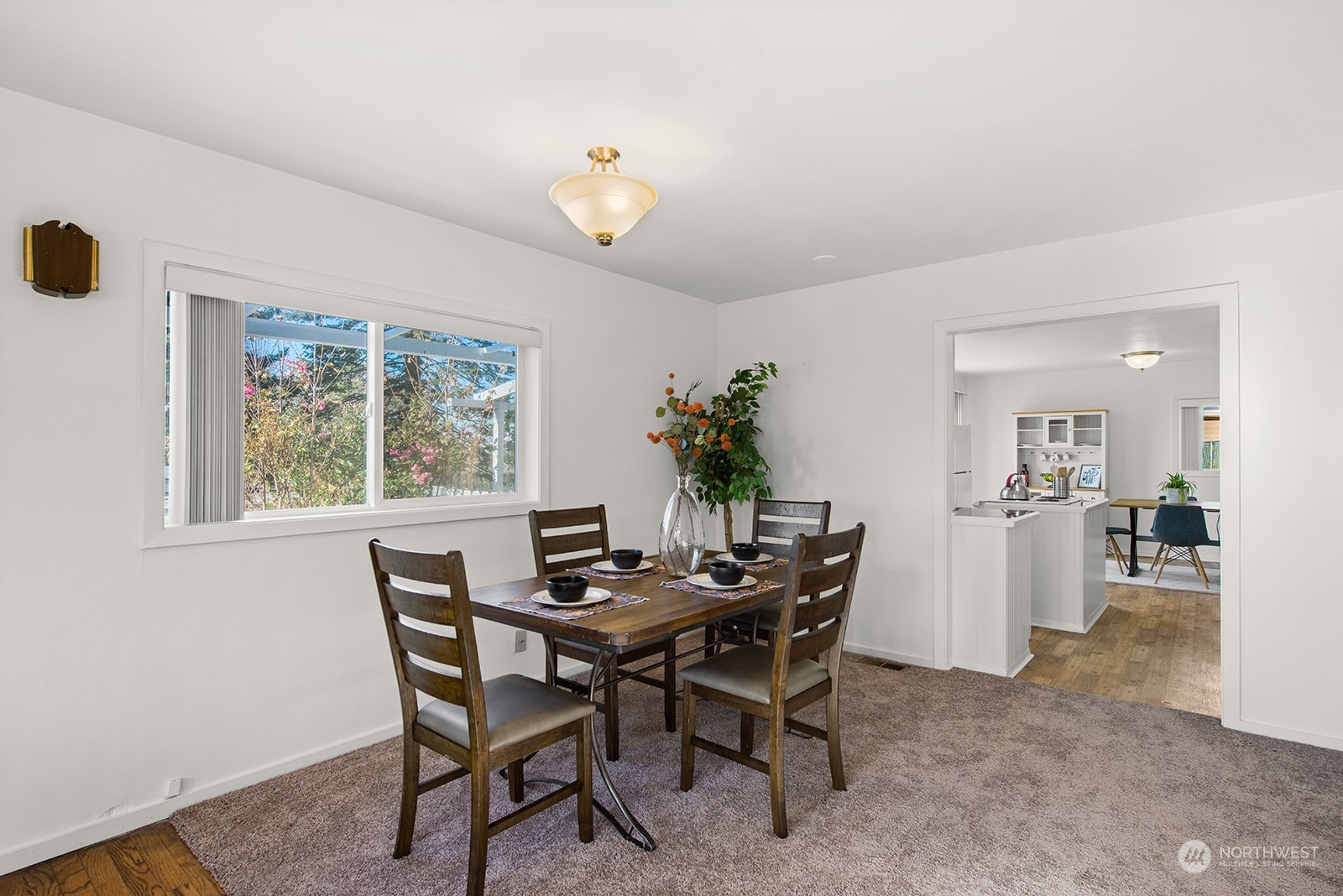 2210 Northeast 8th Street Renton, WA 98056 - Photo 5 of 24 a view of a dining room with furniture and window