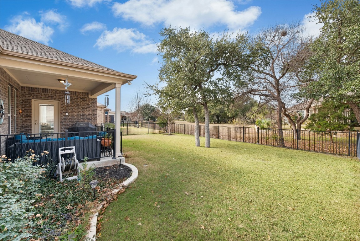 704 Archer Lane Georgetown, TX 78633 - Photo 29 of 40 Back Yard and Greenbelt View