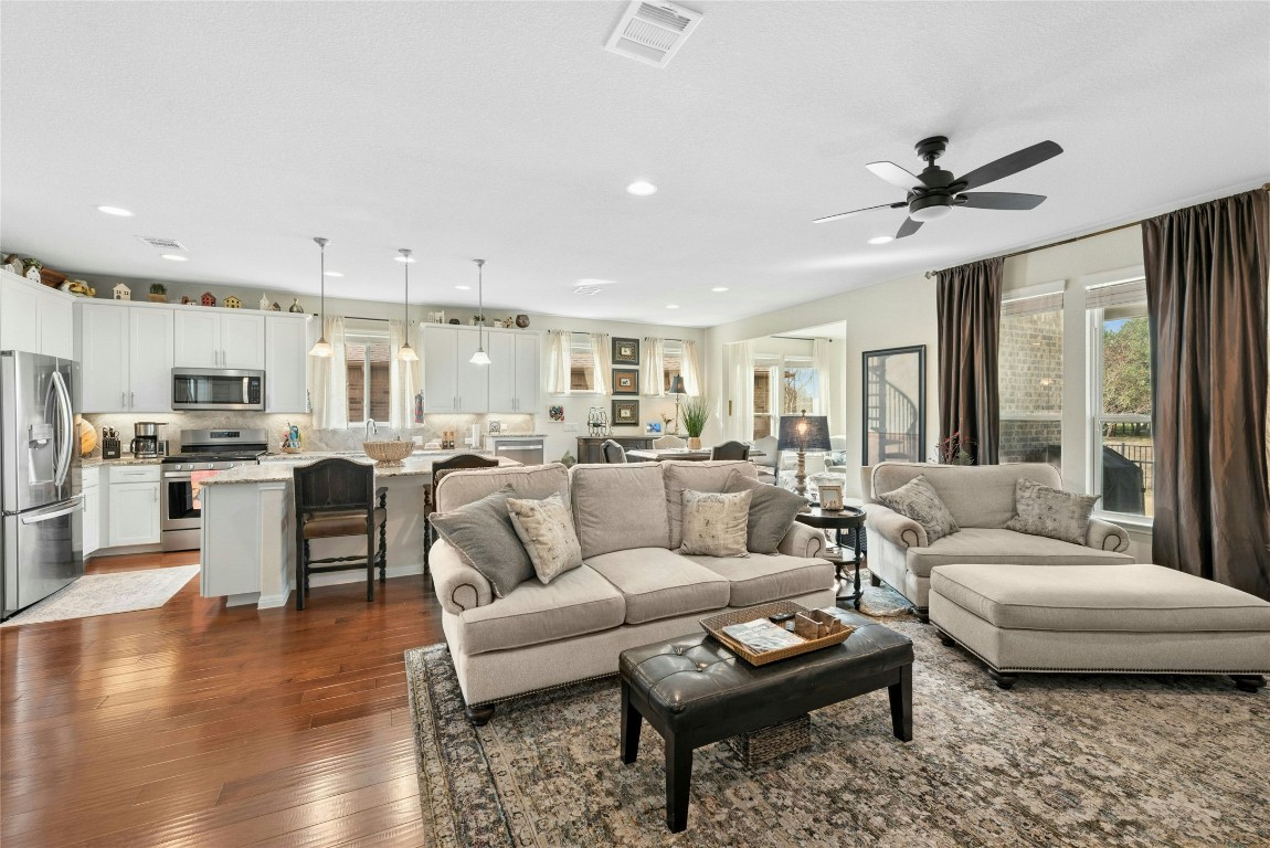 704 Archer Lane Georgetown, TX 78633 - Photo 4 of 40 Living Room and Kitchen