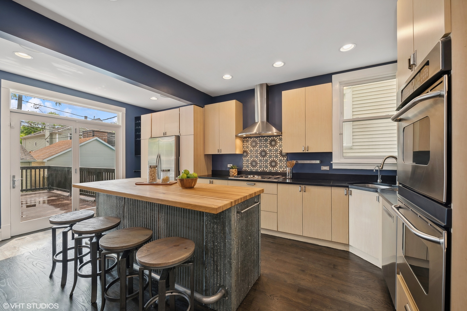 4159 North Bell Avenue Chicago, IL 60618 - Photo 12 of 42 a kitchen with granite countertop a sink appliances and cabinets