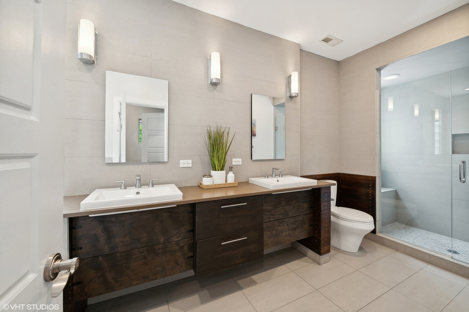 4159 North Bell Avenue Chicago, IL 60618 - Photo 21 of 42 a bathroom with a double vanity sink mirror and toilet