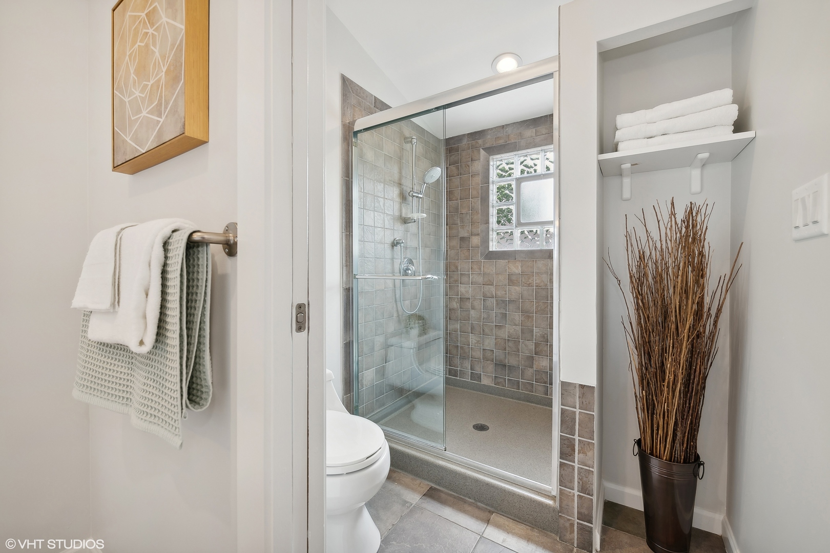 4159 North Bell Avenue Chicago, IL 60618 - Photo 32 of 42 a bathroom with a shower a toilet and a shower