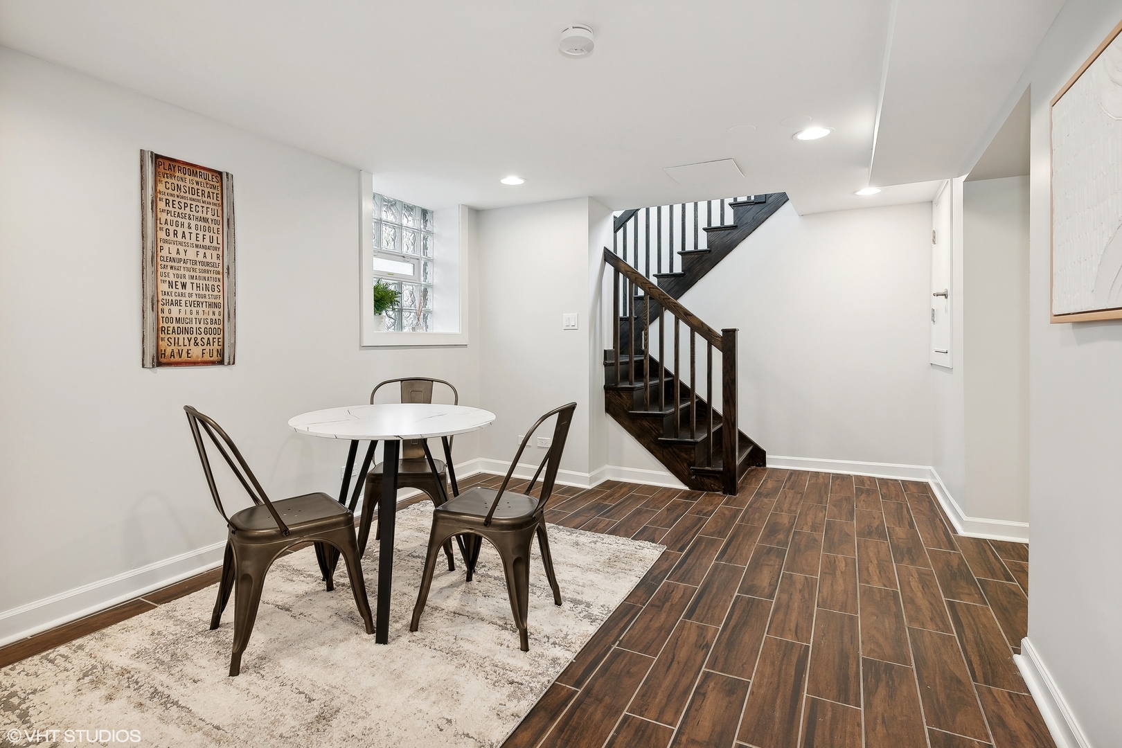 4159 North Bell Avenue Chicago, IL 60618 - Photo 35 of 42 a view of a dining room with furniture and wooden floor