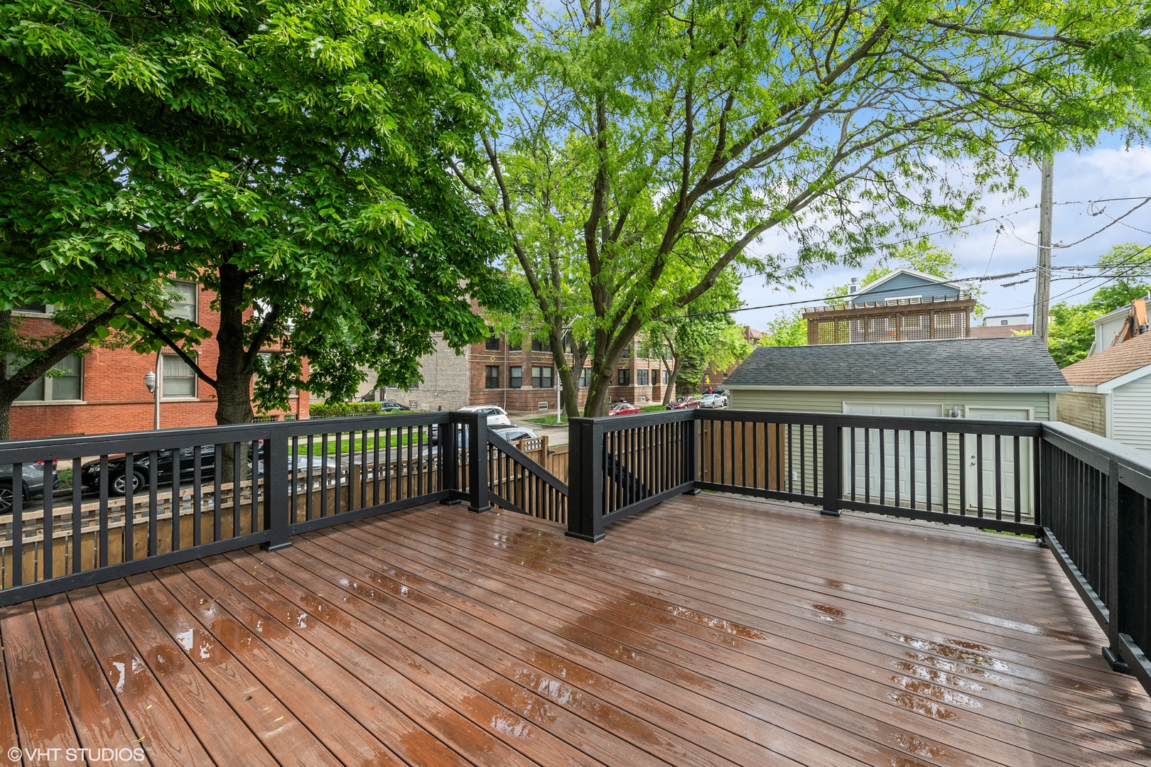 4159 North Bell Avenue Chicago, IL 60618 - Photo 39 of 42 a view of a deck with a large trees