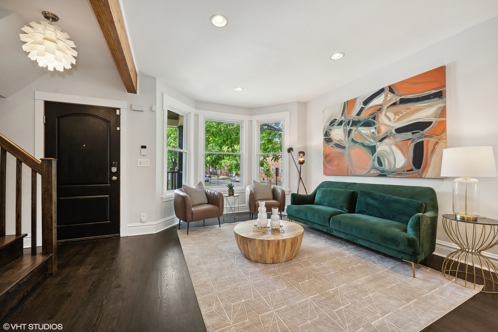 4159 North Bell Avenue Chicago, IL 60618 - Photo 4 of 42 a living room with furniture and a large window