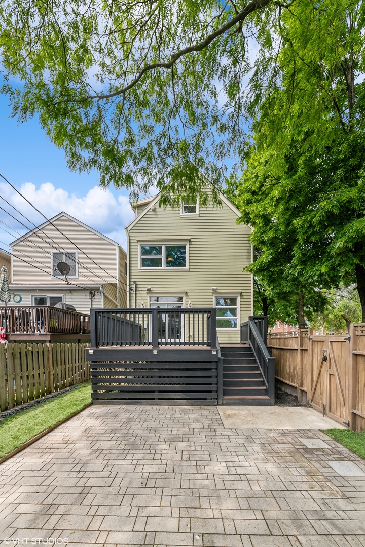 4159 North Bell Avenue Chicago, IL 60618 - Photo 41 of 42 a view of a house with a small deck