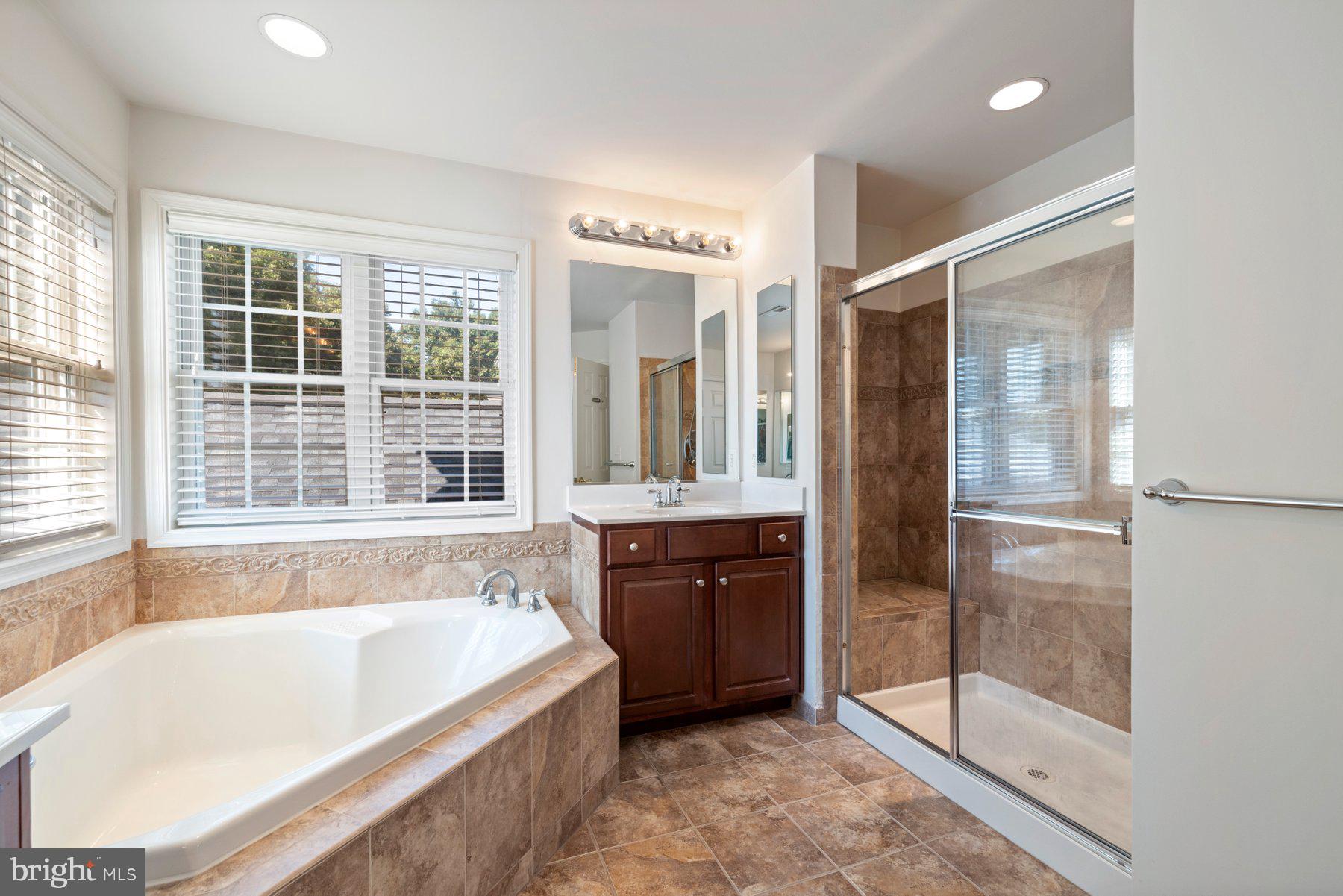 696 Reliance Drive Odenton, MD 21113 - Photo 36 of 82 Primary Bathroom w/ dual vanity & soaking tub