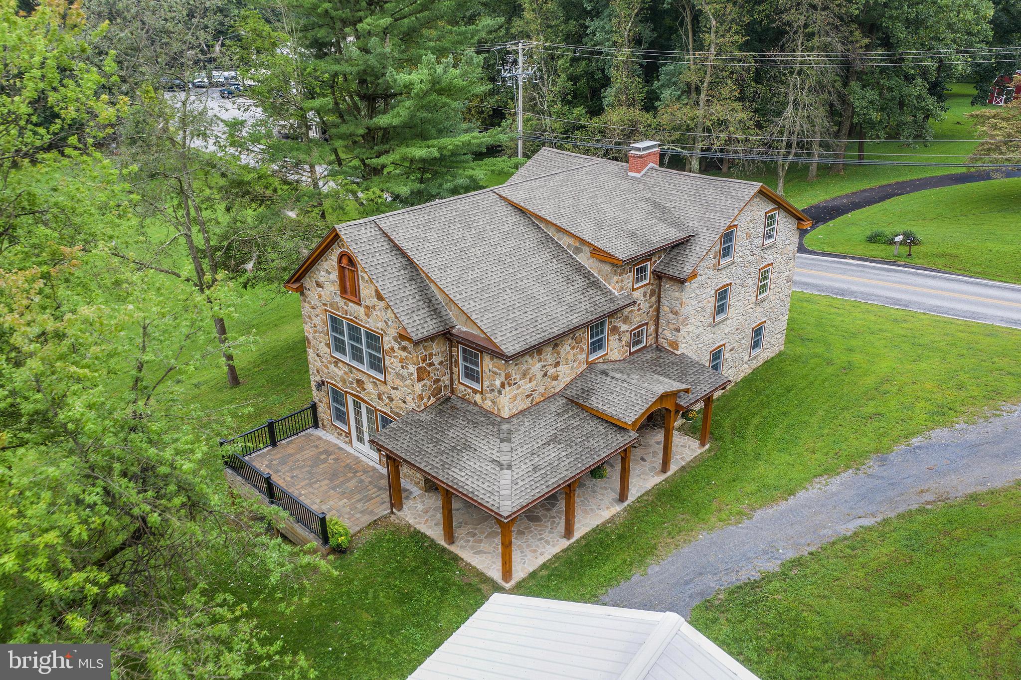 Aerial view of home with addition
