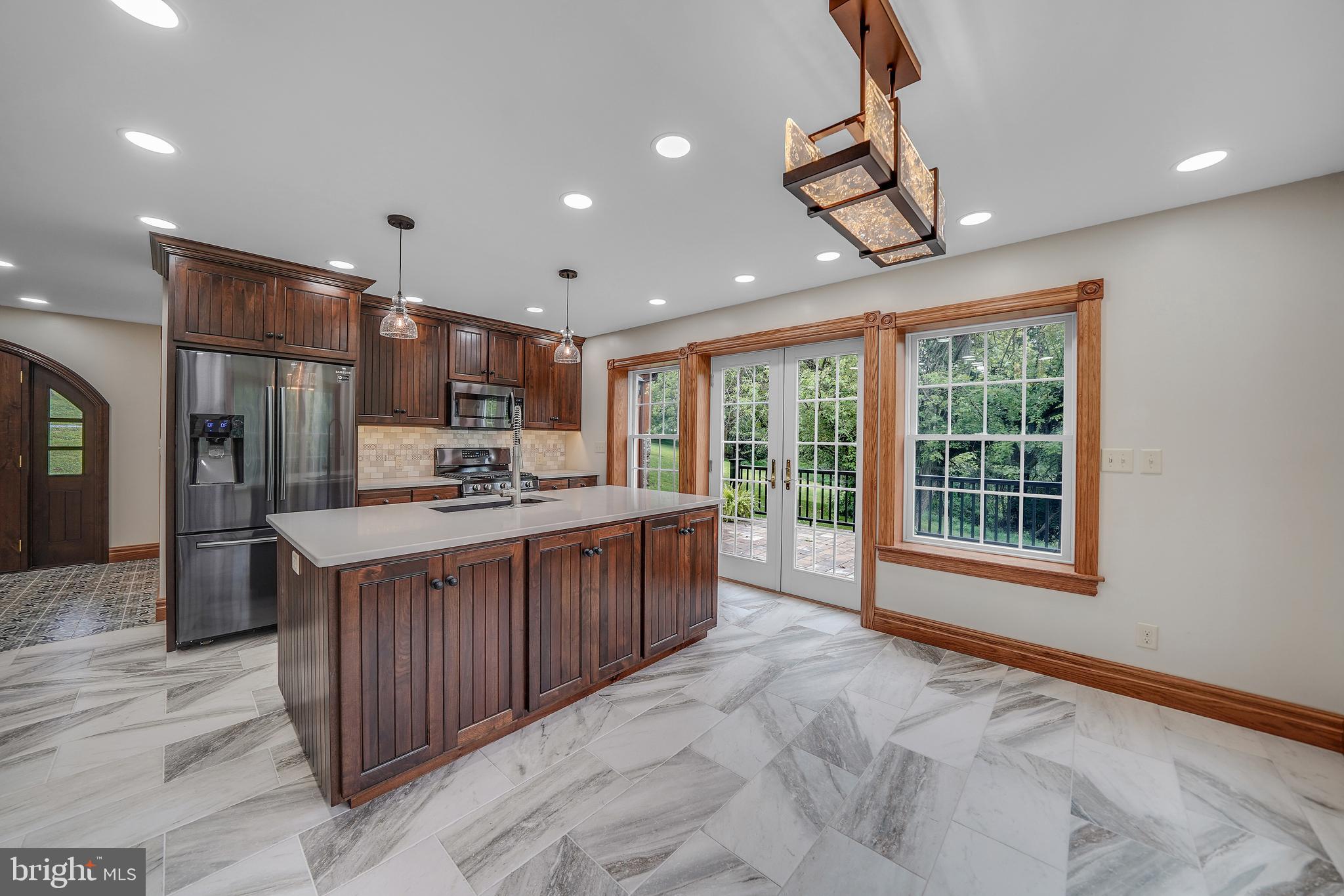 349 Corner Ketch Road Downingtown, PA 19335 - Photo 16 of 69 French doors from kitchen lead to 20'x12' patio