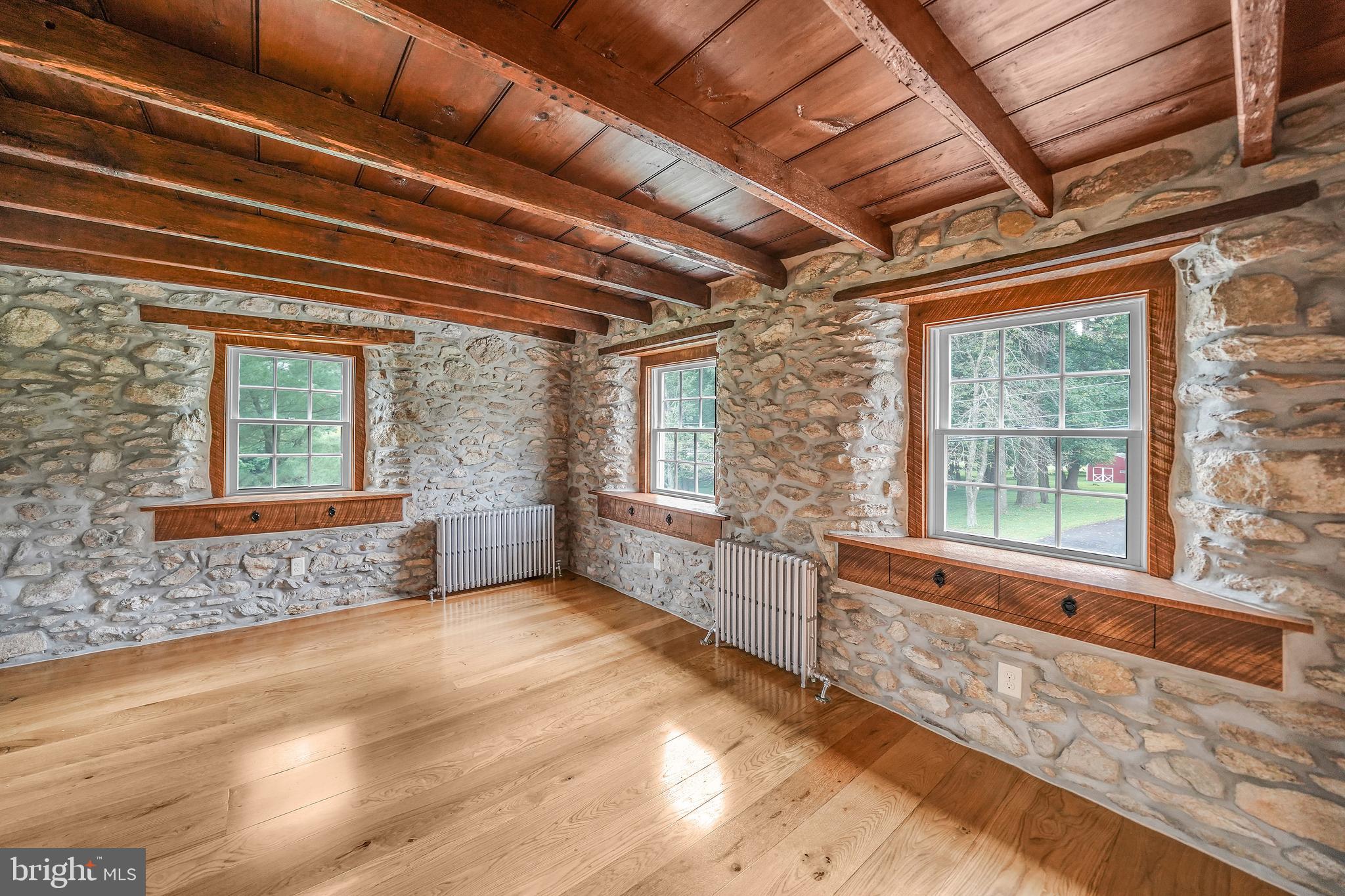 349 Corner Ketch Road Downingtown, PA 19335 - Photo 44 of 69 3rd floor bedroom with exposed beams