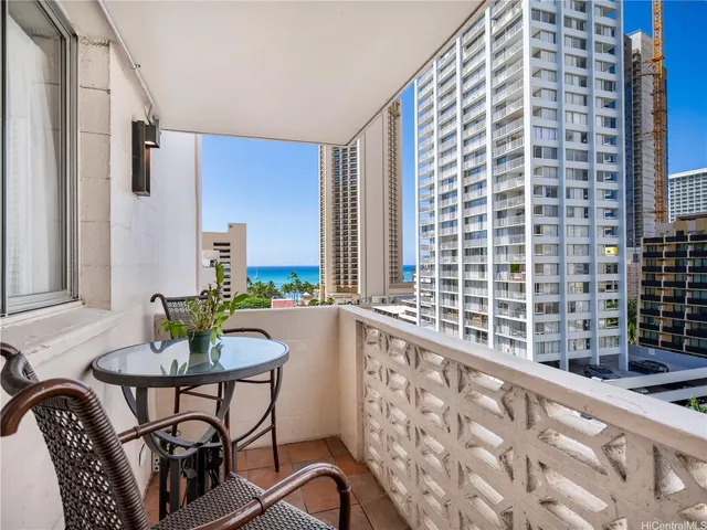 a view of a balcony and chairs