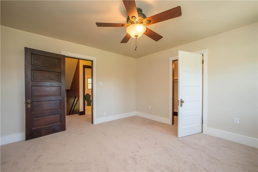 172 Bellbridge Road Elizabeth, PA 15037 - Photo 16 of 25 Bedroom two is situated on the back of the house and is nearly as large as the master bedroom. The open door on the right leads to the walk-in closet. This room is at the top of the stairs from the first floor.