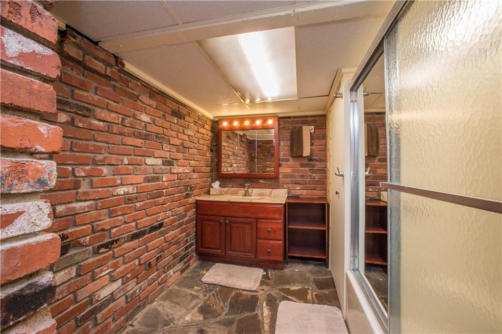 172 Bellbridge Road Elizabeth, PA 15037 - Photo 20 of 25 The bathroom on the lower level has a combination tub and shower, and has the added luxury of heated flooring. There is a linen closet in the bathroom too.