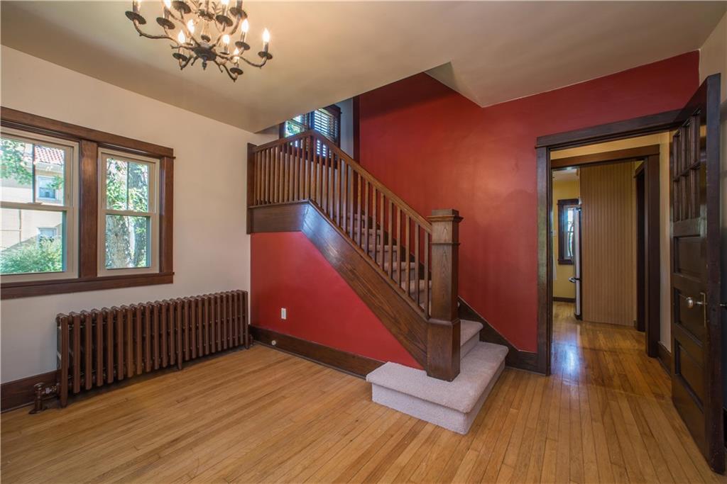 172 Bellbridge Road Elizabeth, PA 15037 - Photo 4 of 25 Windows shown in this view of the foyer overlook the left side yard. The burnt sienna wall tones beautifully complement the spindled balustrade leading to the upper level.