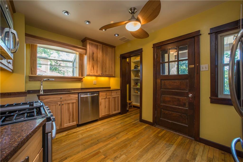 172 Bellbridge Road Elizabeth, PA 15037 - Photo 7 of 25 The kitchen also offers a step-in pantry, ceiling fan, recessed and under cabinet lighting, and hardwood floor. The door on the right opens to the covered rear entry and yard.