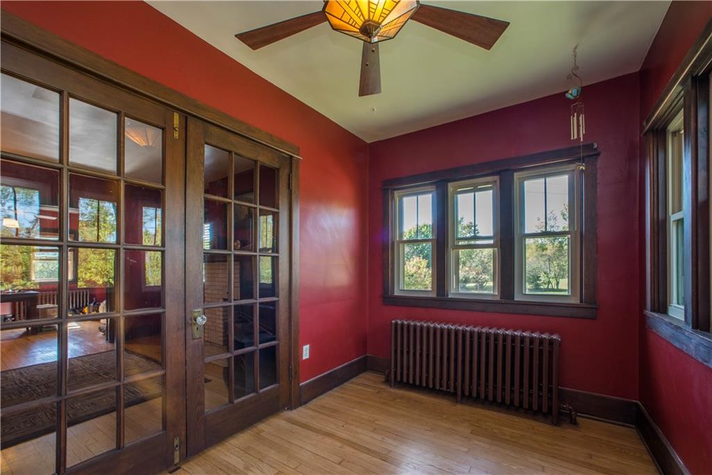 172 Bellbridge Road Elizabeth, PA 15037 - Photo 9 of 25 This view of the den shows the French doors leading to the living room, as well as the Craftsman-style ceiling fan, hardwood floors, and windows overlooking the driveway (at the top center) and front lawn (on the right).