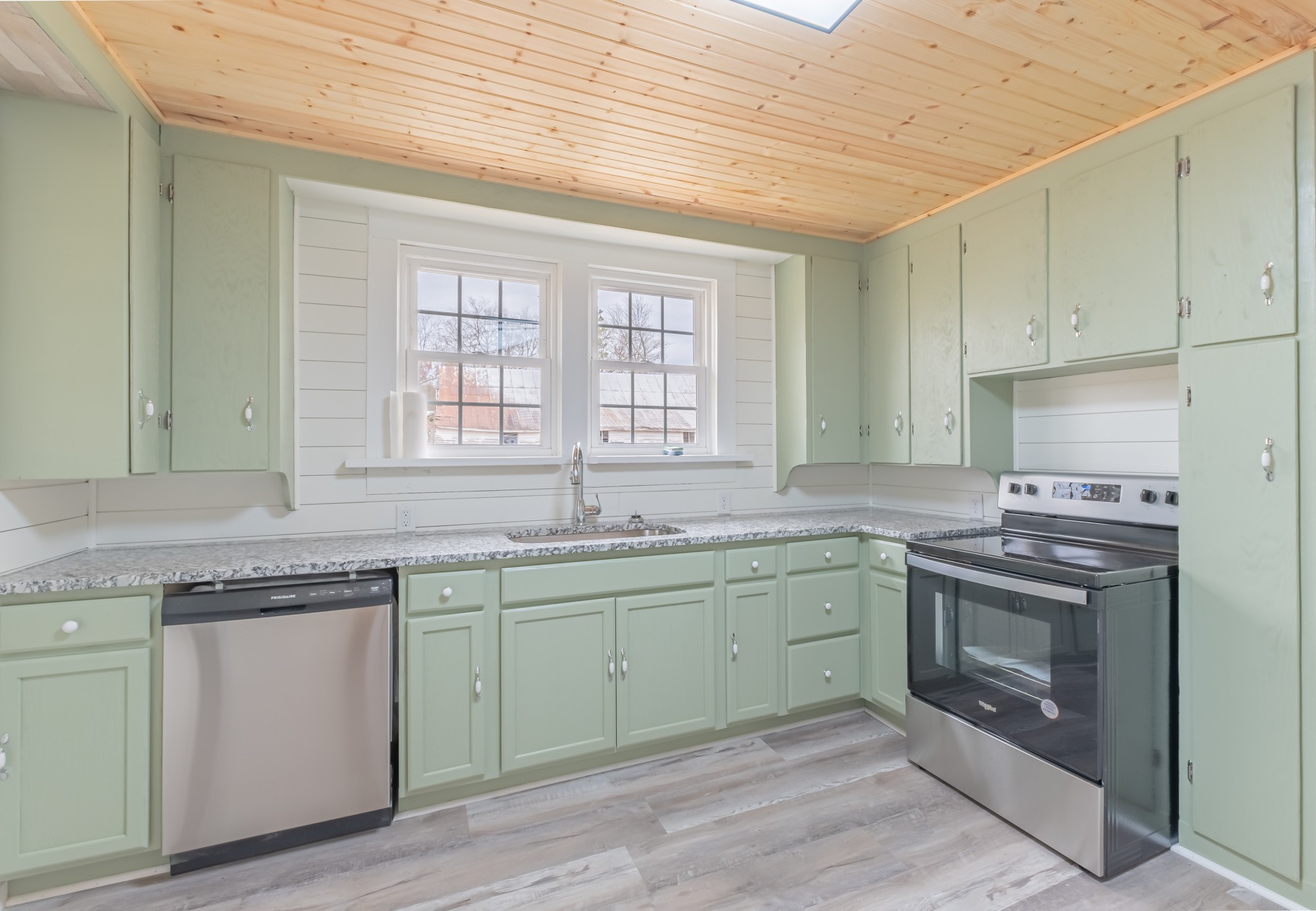 1322 Marble Hill Road Winchester, TN 37398 - Photo 8 of 32 a kitchen with sink stove and cabinets