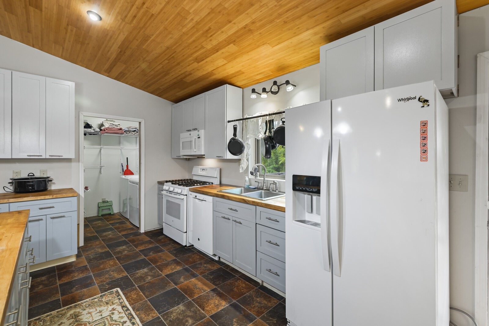 569 Moreland Road Manchester, TN 37355 - Photo 12 of 47 a kitchen with cabinets and stainless steel appliances