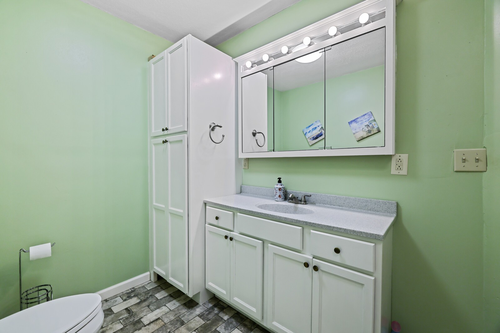 569 Moreland Road Manchester, TN 37355 - Photo 18 of 47 a bathroom with a sink and a mirror