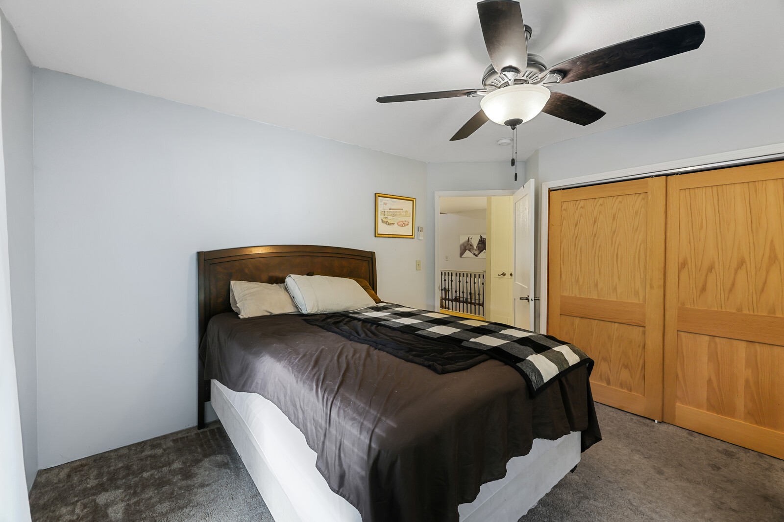 569 Moreland Road Manchester, TN 37355 - Photo 20 of 47 a bedroom with a bed and a chandelier