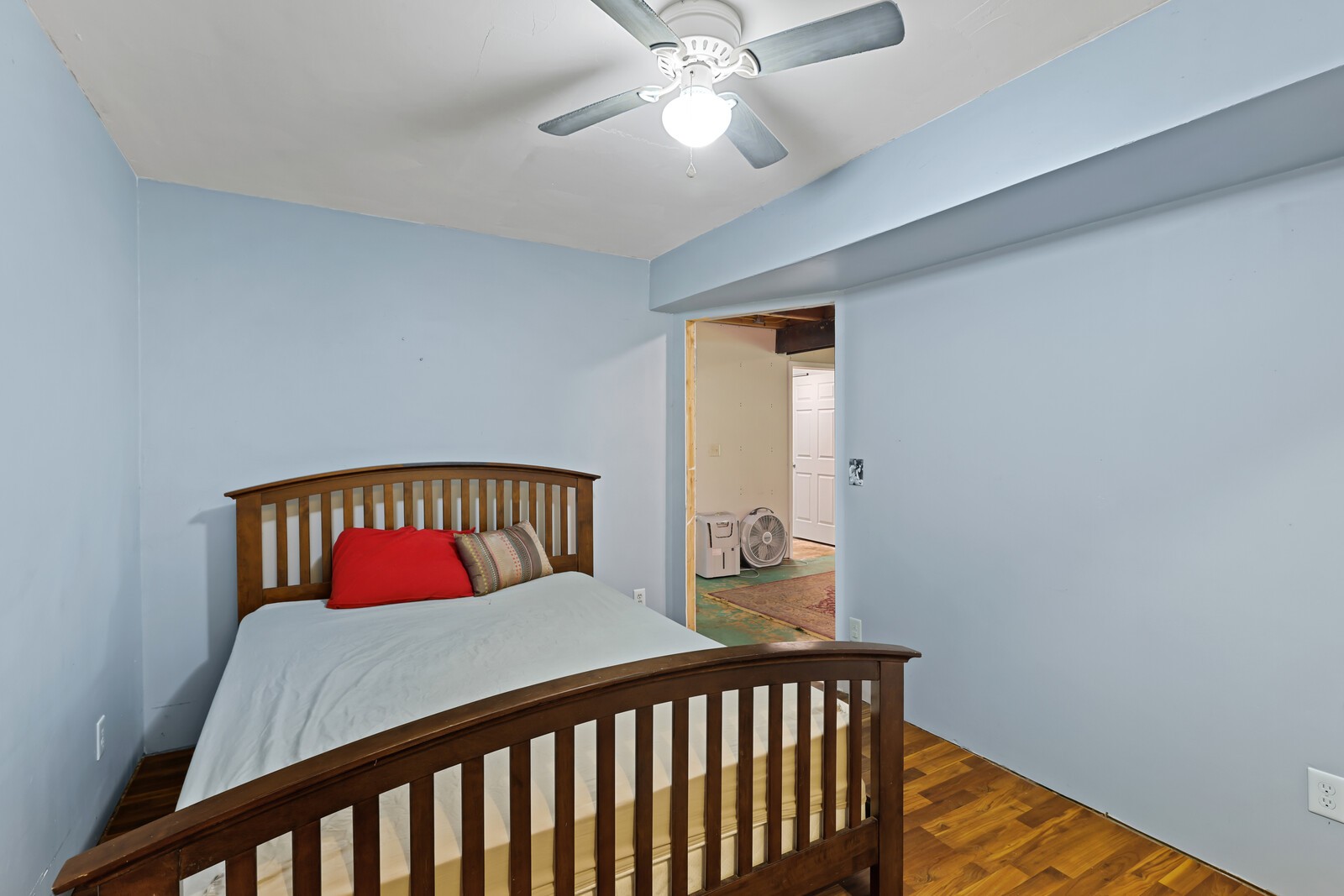569 Moreland Road Manchester, TN 37355 - Photo 29 of 47 a bedroom with a bed and a chandelier fan