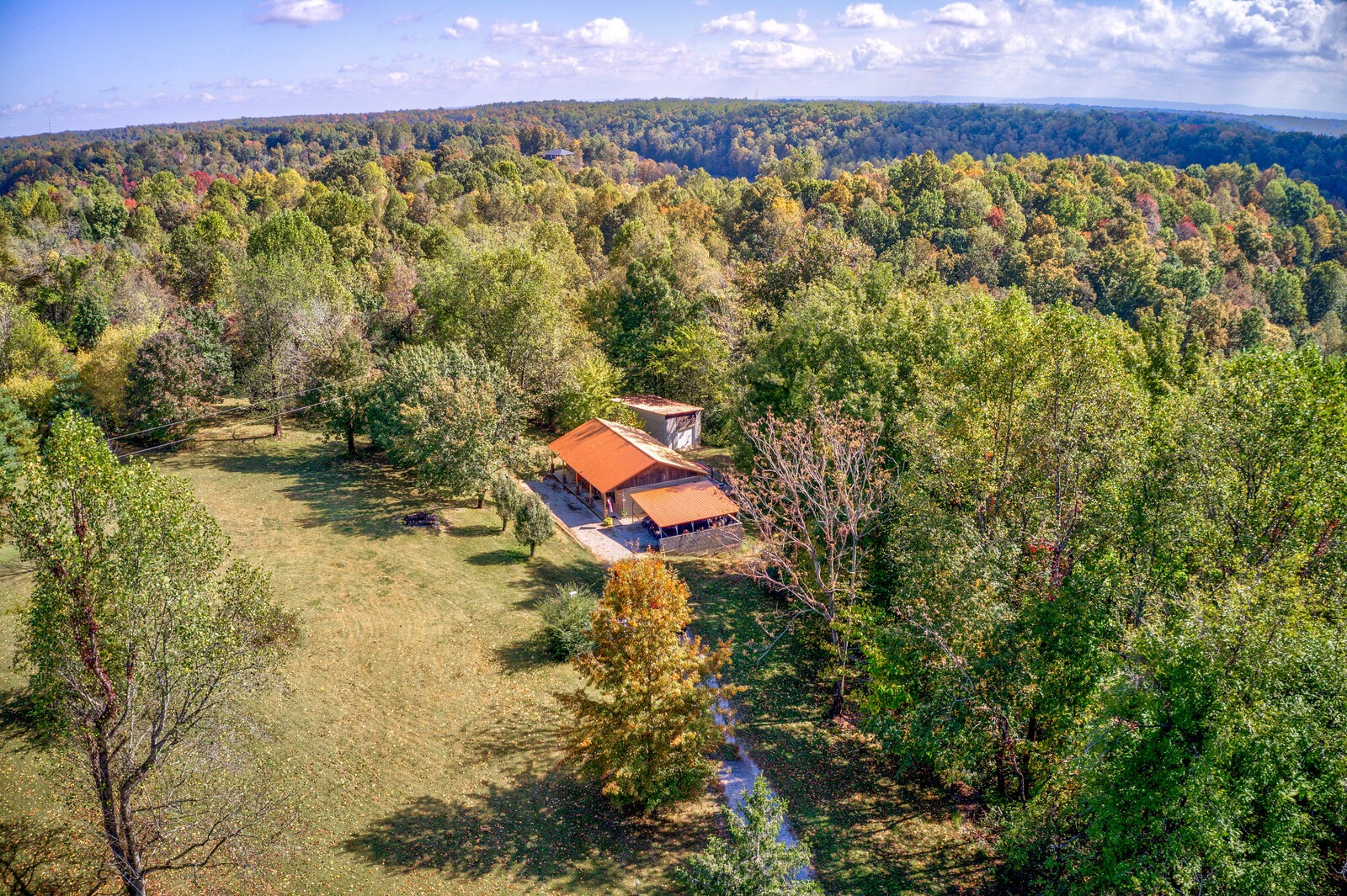 569 Moreland Road Manchester, TN 37355 - Photo 36 of 47 a aerial view of a house with a yard and lake view