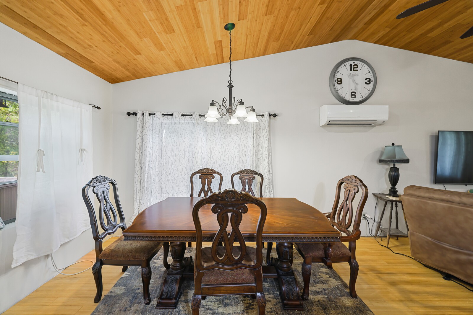569 Moreland Road Manchester, TN 37355 - Photo 9 of 47 a view of a dining room with furniture and chandelier