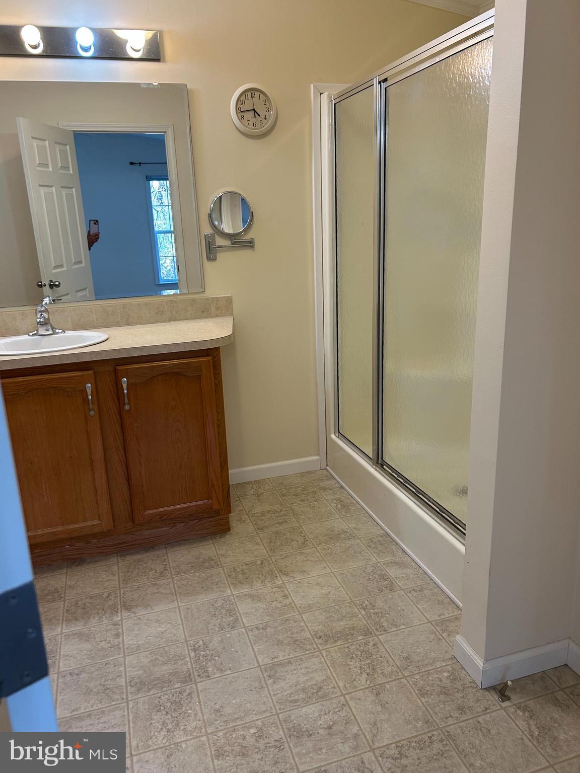 94 Random Road Douglassville, PA 19518 - Photo 14 of 27 a bathroom with a sink and a mirror