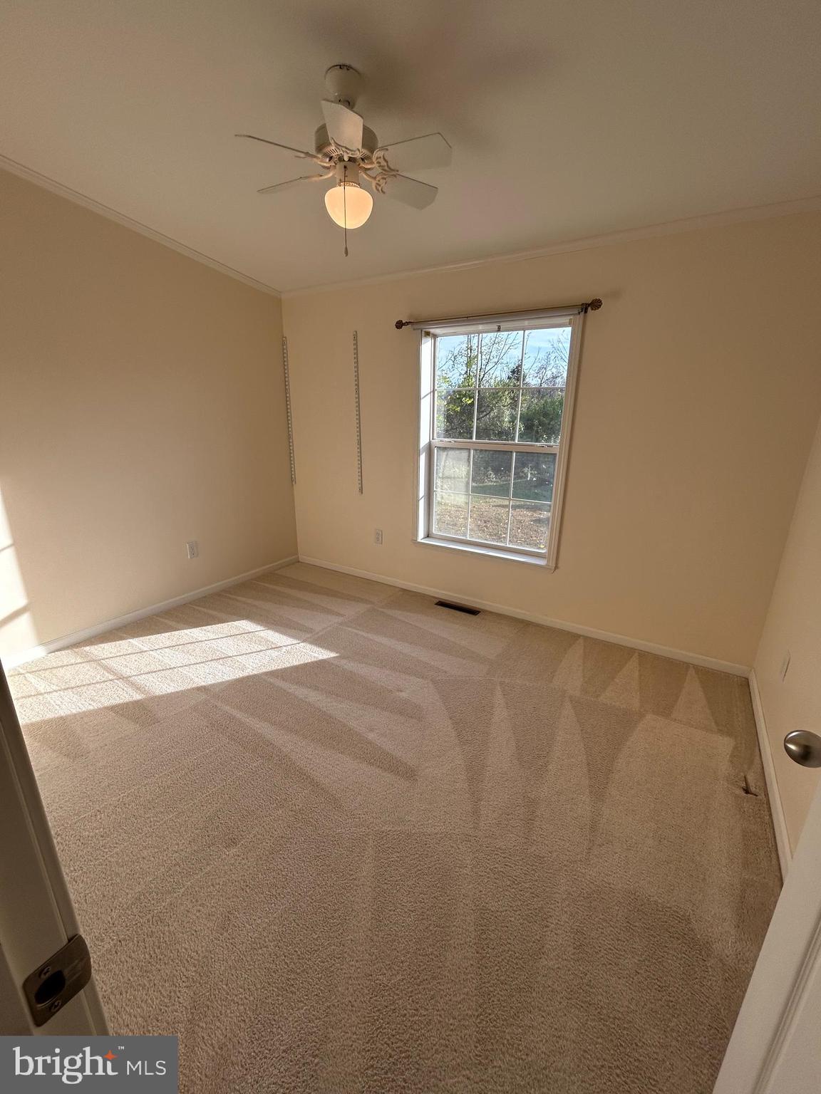 94 Random Road Douglassville, PA 19518 - Photo 19 of 27 a view of an empty room with a window