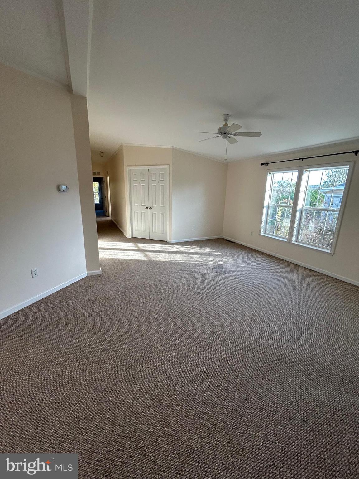 94 Random Road Douglassville, PA 19518 - Photo 4 of 27 an empty room with windows and closet