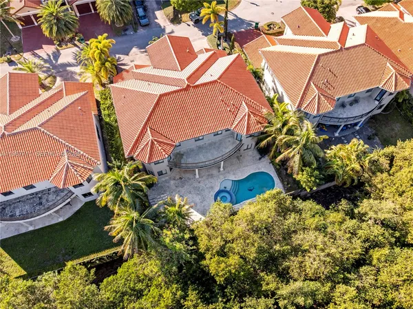 an aerial view of a houses with outdoor space