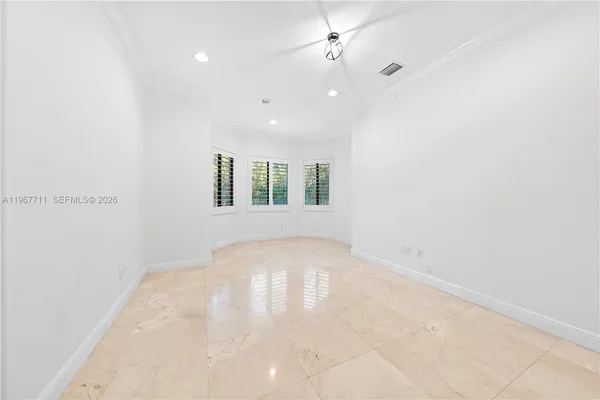 a view of a living room with a fireplace