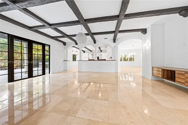 a bathroom with a toilet a sink and a mirror