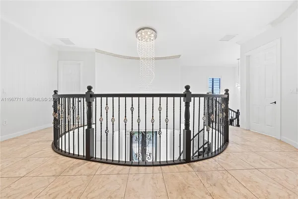 a spacious bathroom with a bathtub and a toilet