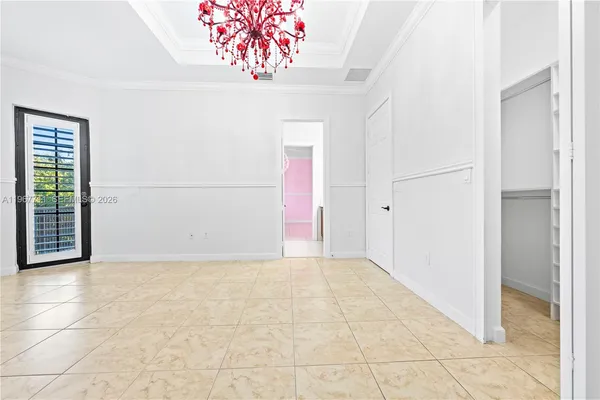 a view of a house with a yard and garage